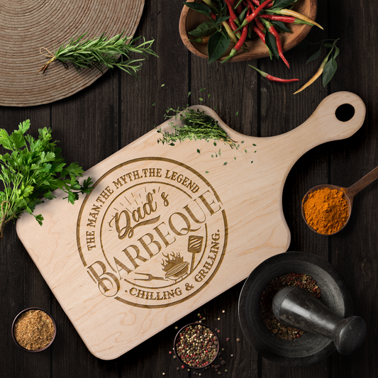 Dads_Barbeque_Paddle_Cutting_Board_Light_Handle_Horizontal_Lifestyle_Mockup.png